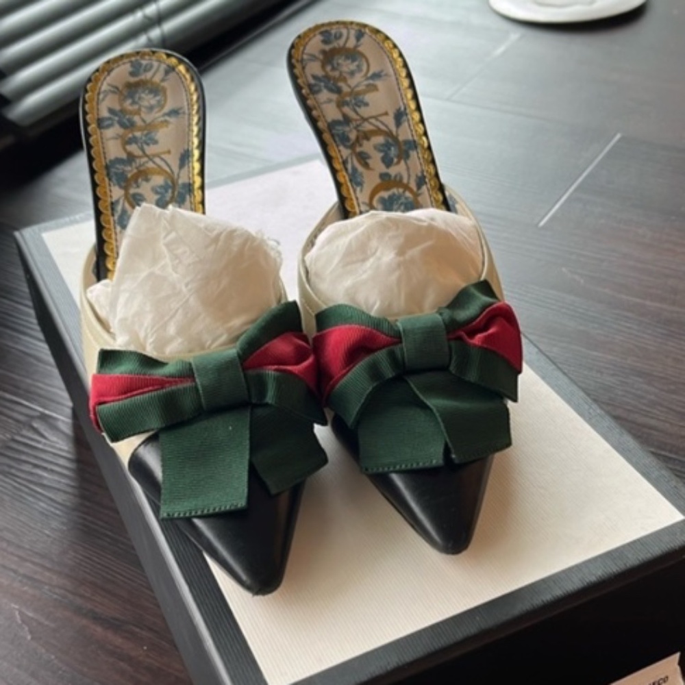 Gucci Sylvie web bow leather mules heels
